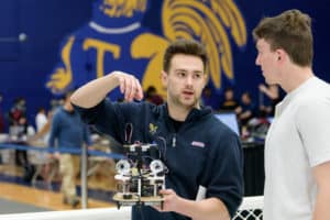 Trinity students Alex Prigge and Andrew Clark at the 2019 Robot Contest