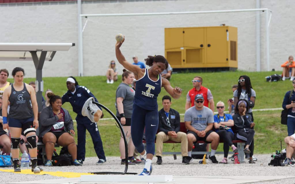 Peace Kabari throwing the shotput