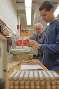 Joe Ruggiero and Christoph Geiss testing concrete