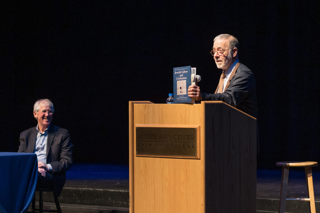 David Roskies holding a book